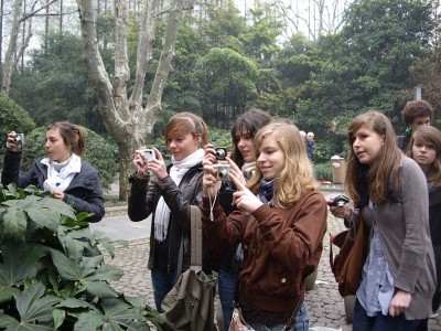 Le cliché des touristes aux appareils photo...
