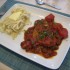 COTES DE PORC A LA SAUCE TOMAT