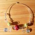 collier tortillon argenté et miracles