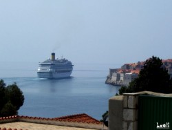 The huge boat (ferry I think) was leaving: so bigger than the city walls!!