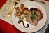 TRANCHES DE CARRE DE PORC à la compotée