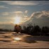 Soleil entre glace et neige