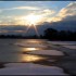 Soleil entre glace et neige