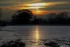 Coucher du soleil sous fond de
