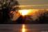 Coucher du soleil sous fond de
