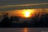 Coucher du soleil sous fond de