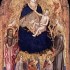"La Vierge et l'Enfant avec quatre saints et trois anges musiciens" a été réalisée par l'artiste Mariotto di Nardo (connu de 1393 à 1424)
